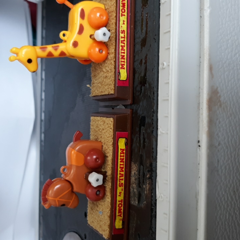 White knob wind up toys from the 1980's